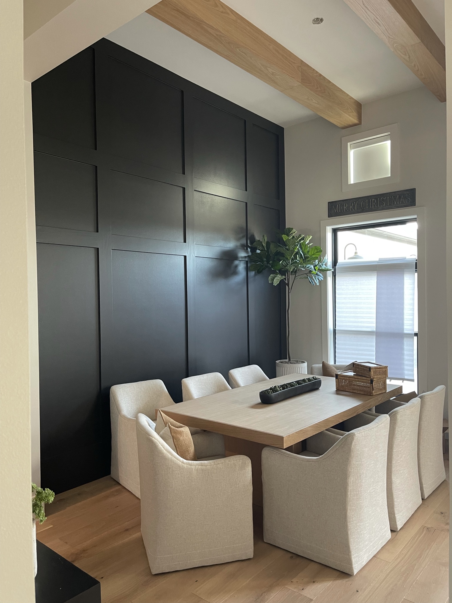 Black Wall Paneling in Dining Room